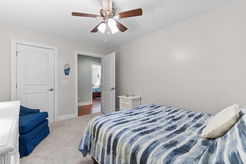 This spacious 4-bedroom, 3-bath home offers a versatile open - photo 31