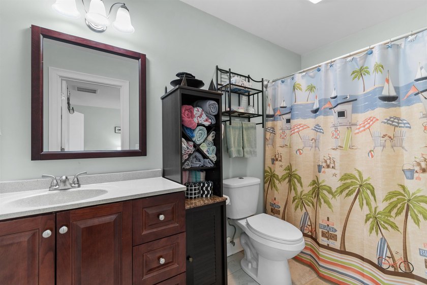 This spacious 4-bedroom, 3-bath home offers a versatile open - photo 33