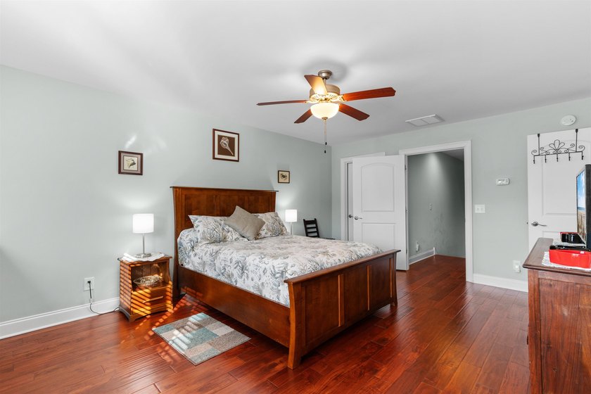 This spacious 4-bedroom, 3-bath home offers a versatile open - photo 34