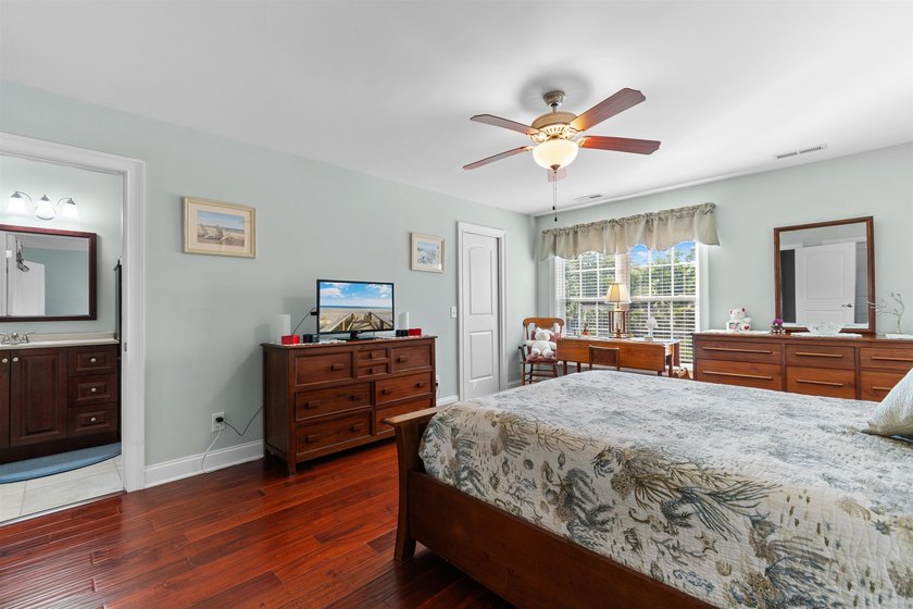 This spacious 4-bedroom, 3-bath home offers a versatile open - photo 35