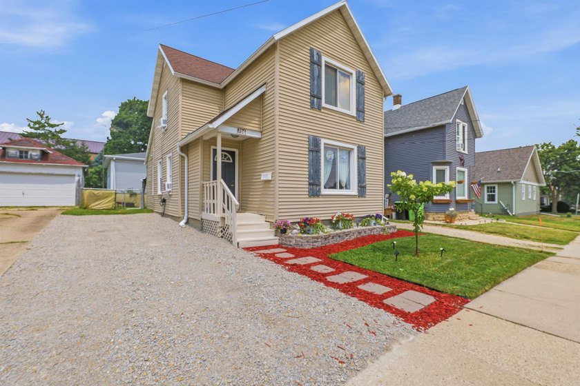 Welcome home to this charming 3-bedroom, 1.5-bath home featuring - photo 2