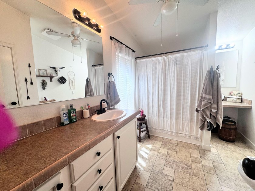 This is a 3 bedroom 2 full bath manufactured home on land - photo 24