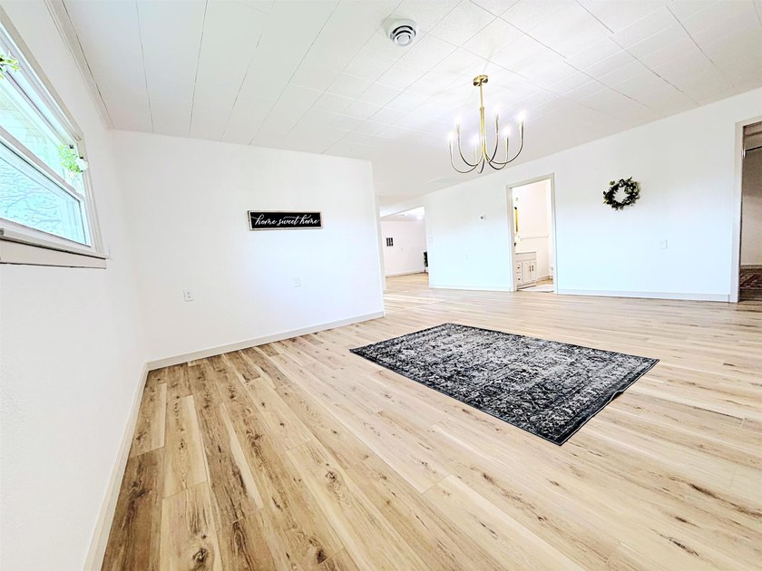 Completely updated sprawling 4 bedroom 2 bath ranch in the - photo 6