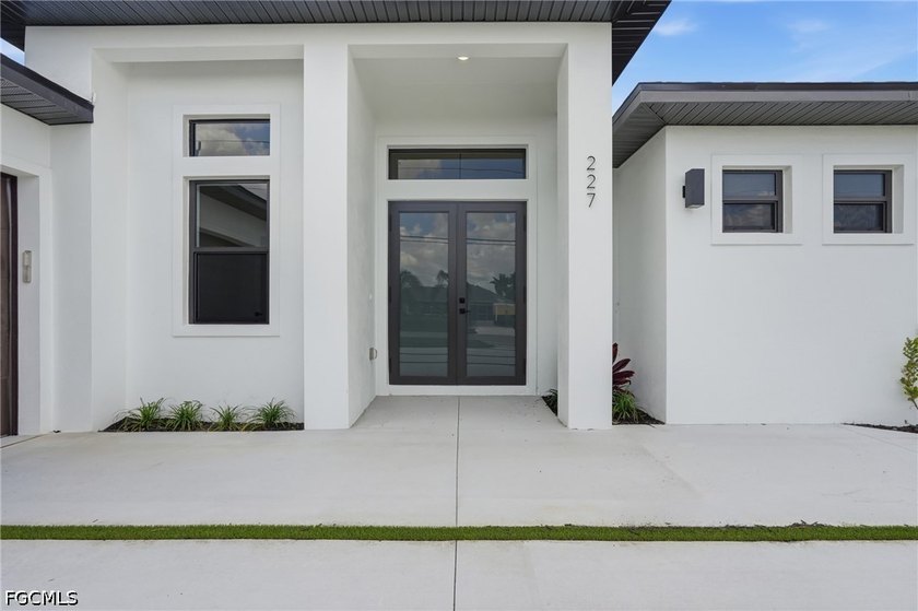 Experience contemporary waterfront living in this beautifully - photo 8
