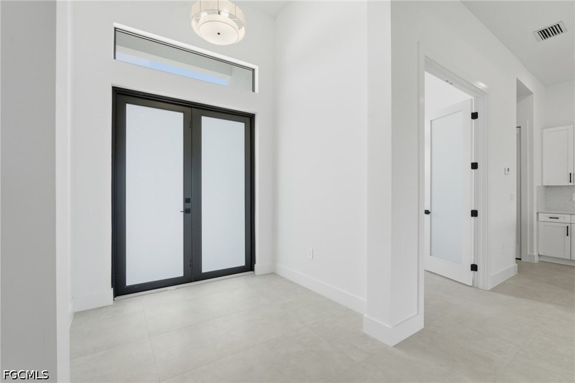 Experience contemporary waterfront living in this beautifully - photo 9