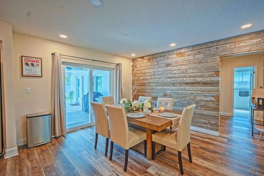 This beautifully maintained 4/2 pool home offers just under 2 - photo 3