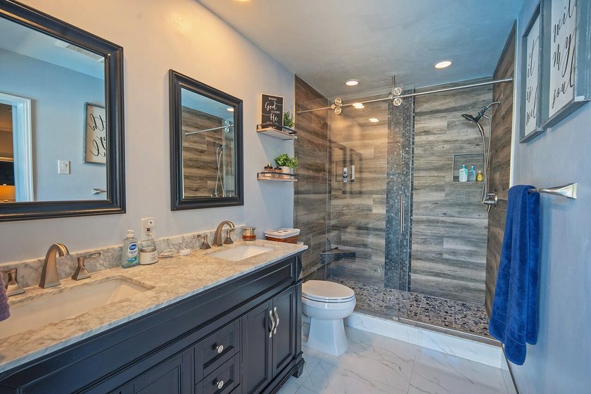 This beautifully maintained 4/2 pool home offers just under 2 - photo 7