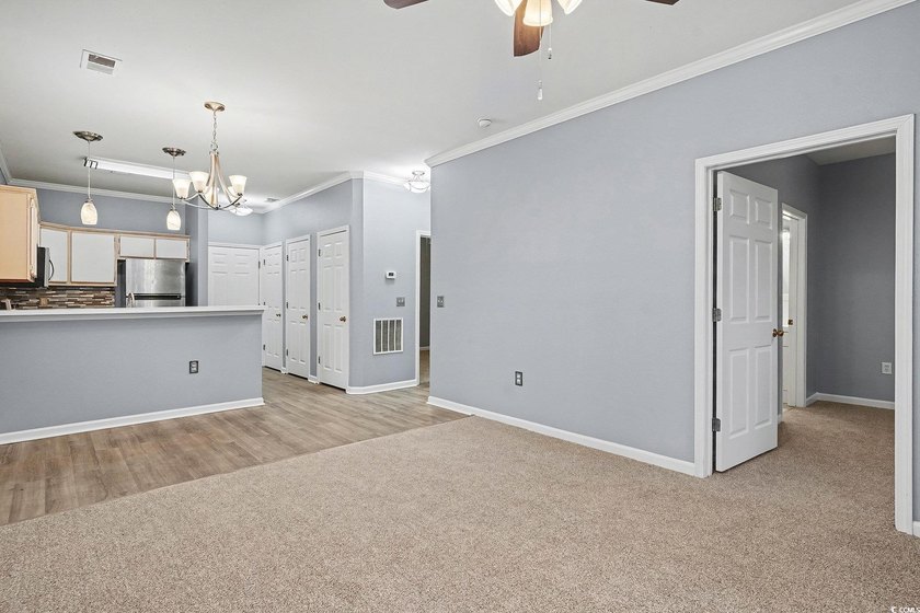 This welcoming 2-bedroom, 2-bath first-floor end-unit condo sits - photo 5