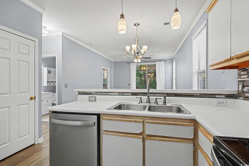 This welcoming 2-bedroom, 2-bath first-floor end-unit condo sits - photo 8