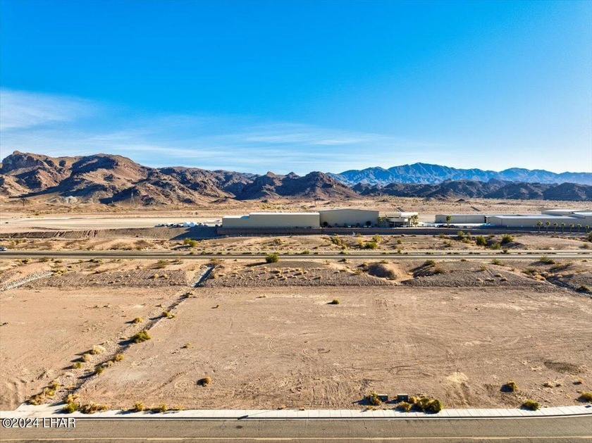 1.27-acre commercial lot! A golden opportunity awaiting your - photo 3