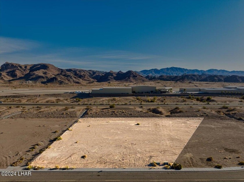 1.27-acre commercial lot! A golden opportunity awaiting your - photo 4