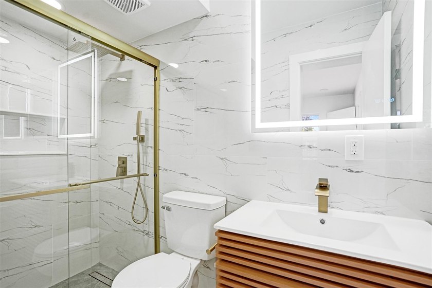 Completely renovated 4-bedroom, 3-bathroom home in desirable - photo 12