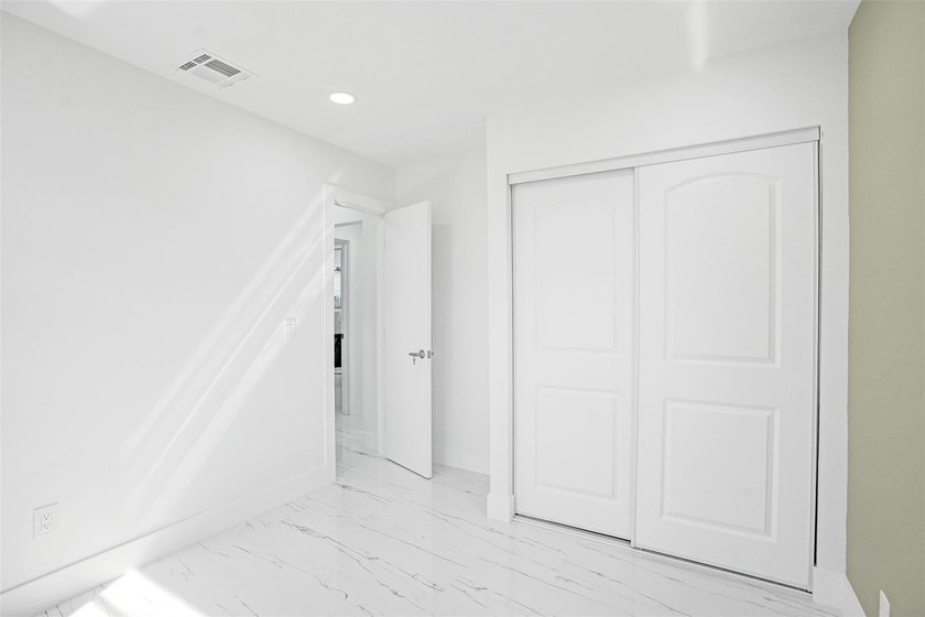 Completely renovated 4-bedroom, 3-bathroom home in desirable - photo 15
