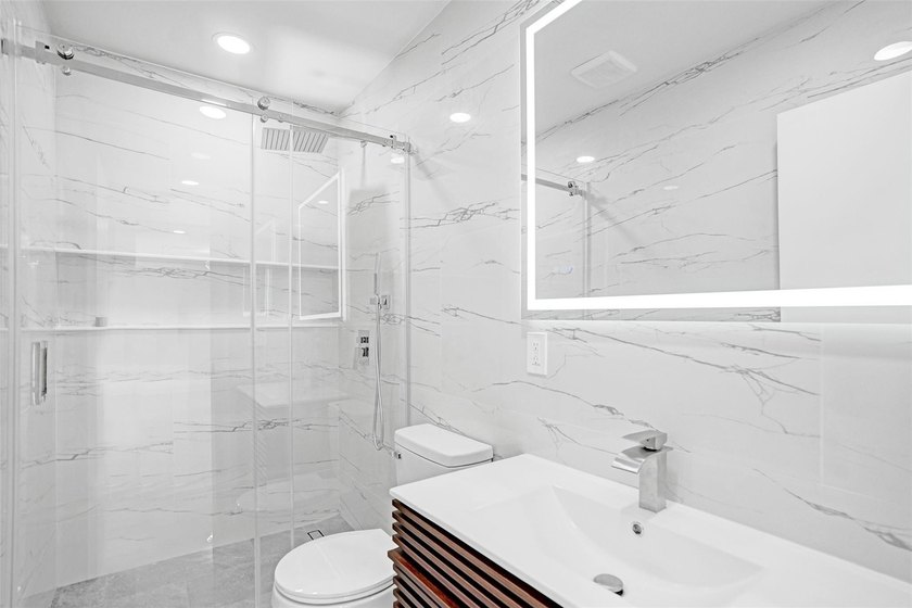 Completely renovated 4-bedroom, 3-bathroom home in desirable - photo 16