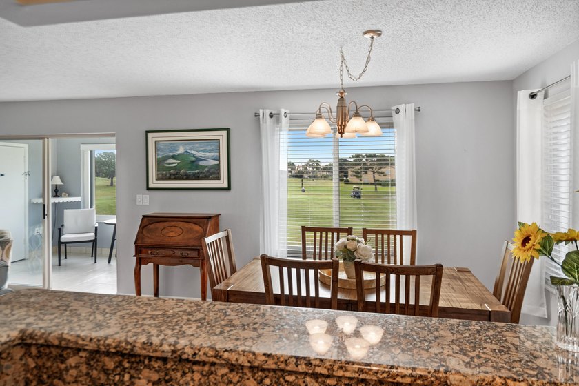 Rarely available 3-bedroom, 2-bath, glass-enclosed flex/sunroom - photo 3