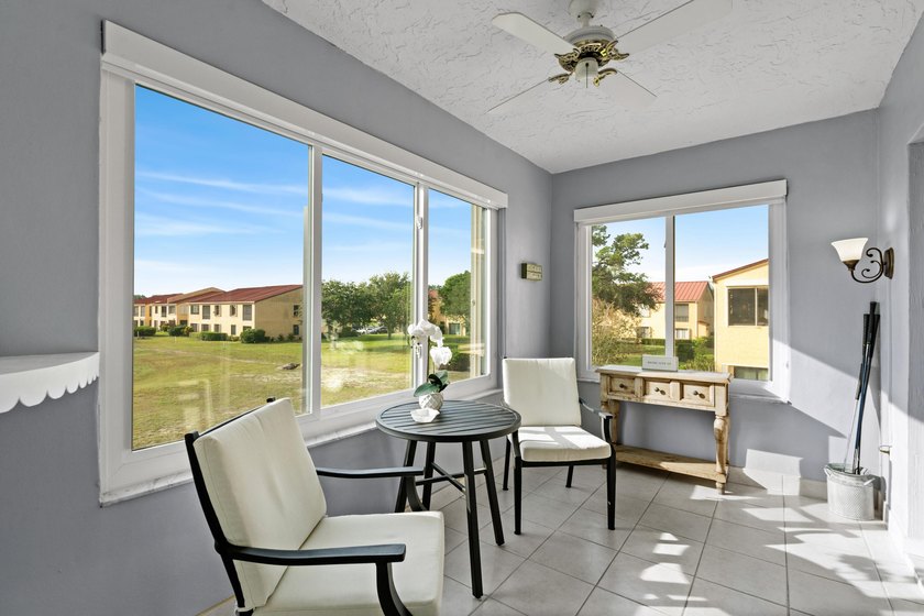 Rarely available 3-bedroom, 2-bath, glass-enclosed flex/sunroom - photo 6