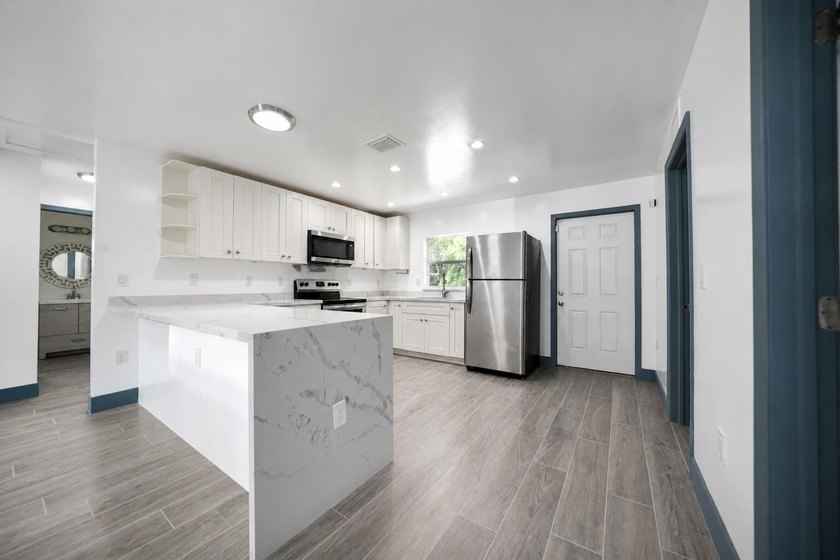 Completely renovated newer construction home featuring 3 - photo 4