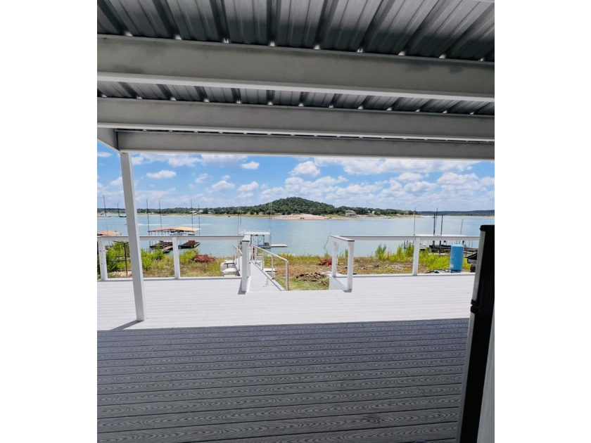 Escape to the lake in this beautifully remodeled, fully - photo 3