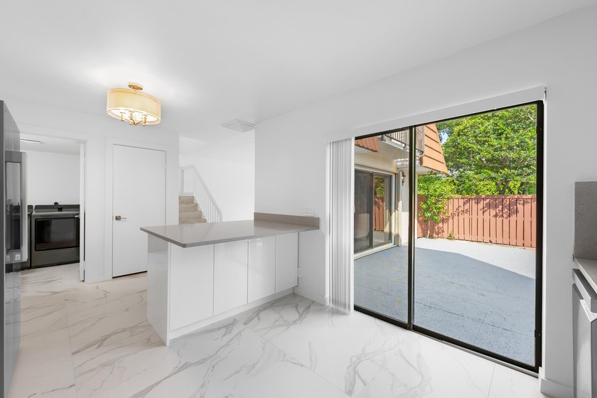 Beautifully renovated corner-unit townhome featuring 2 bedrooms - photo 6