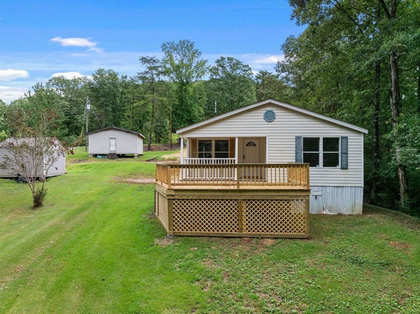 One of a kind mobile home sitting on Bear Creek, with navigable - photo 4