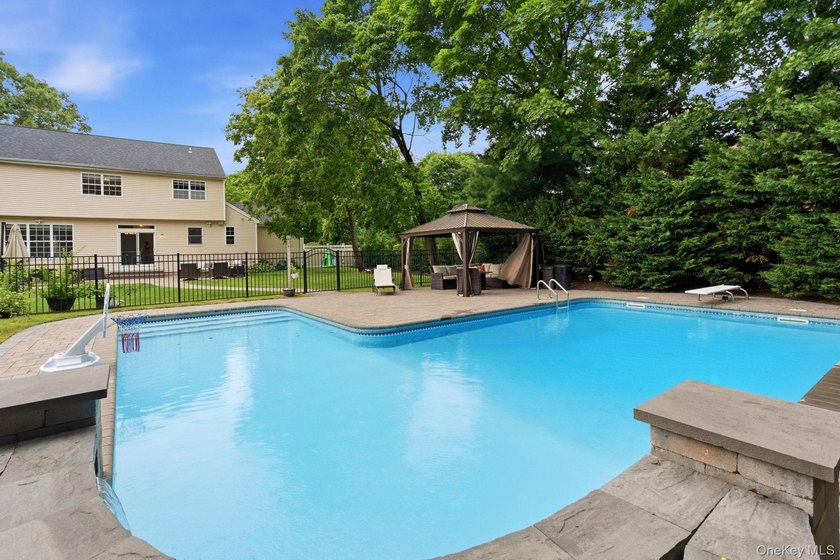 Welcome home to this Post Modern Colonial, where an impressive - photo 3