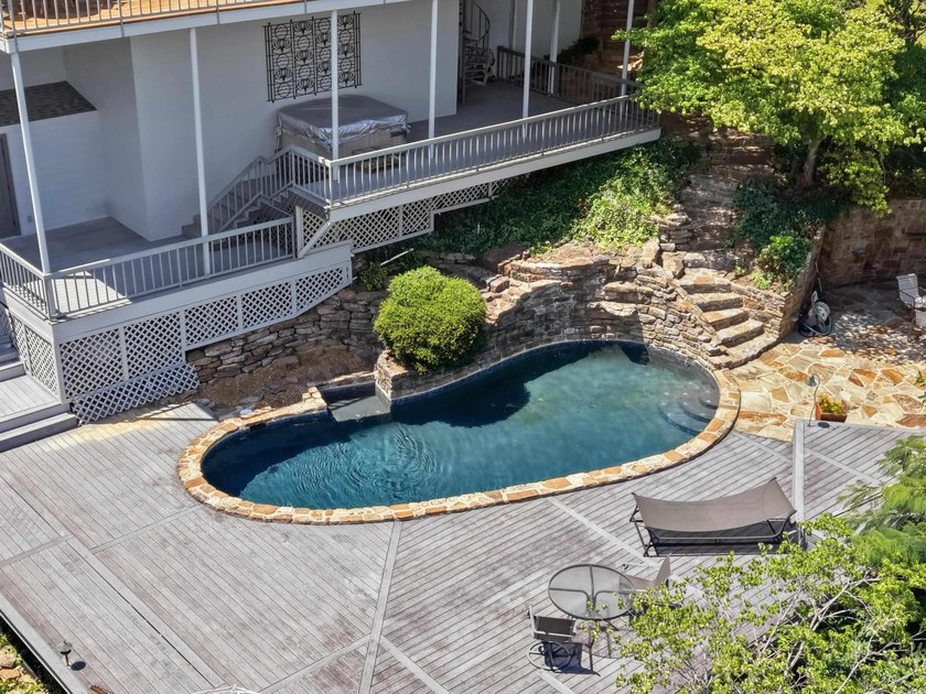 The epitome of luxury lakefront living on Greers Ferry Lake with - photo 4