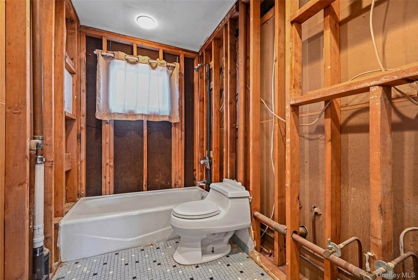 Waterfront high ranch offering 4 bedrooms and 2 full baths, set - photo 14