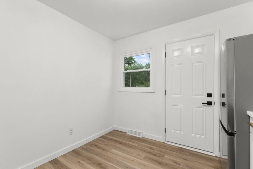 Completely updated 4-bedroom home situated on 2.9 private acres - photo 7