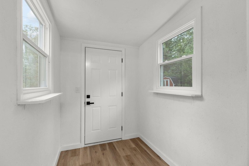 Completely updated 4-bedroom home situated on 2.9 private acres - photo 9