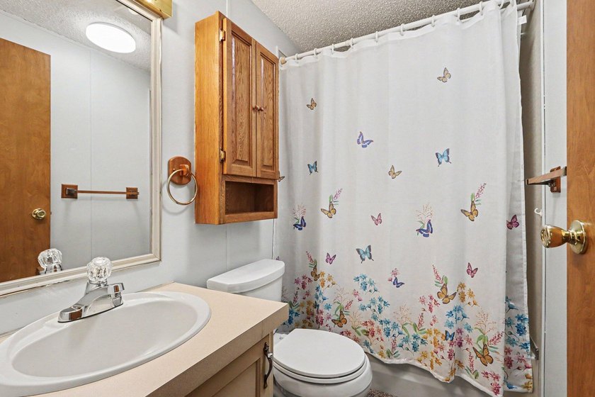 Move-in ready peace and tranquility await you! Situated on a - photo 13
