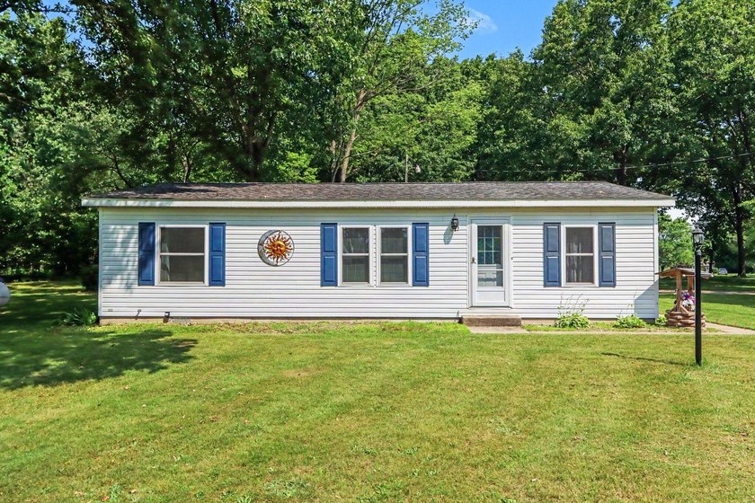 Move-in ready peace and tranquility await you! Situated on a - photo 16