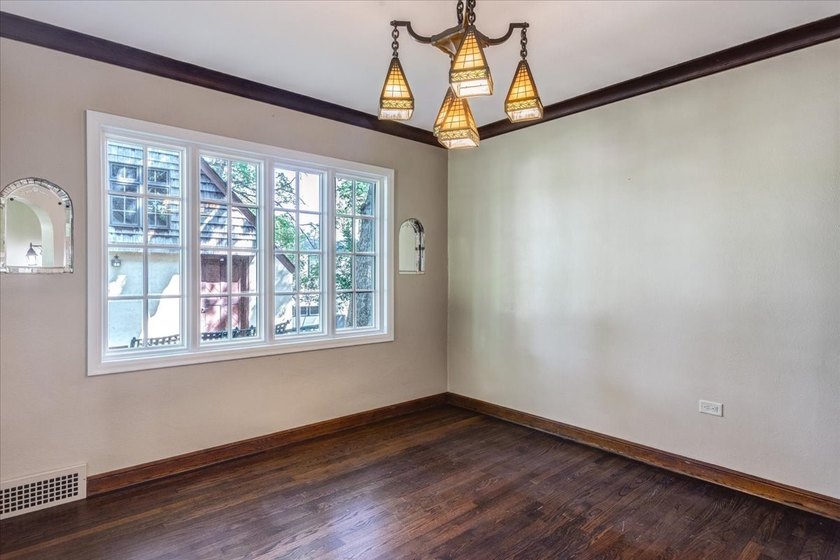 Architectural Gem with Timeless Tudor Charm! Fall in love with - photo 12