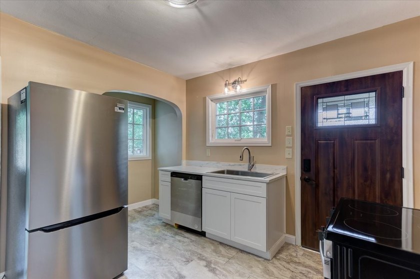 Architectural Gem with Timeless Tudor Charm! Fall in love with - photo 13