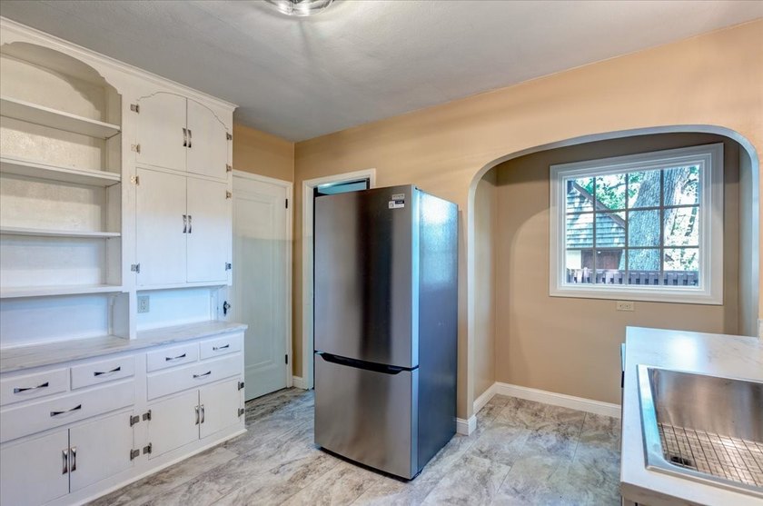 Architectural Gem with Timeless Tudor Charm! Fall in love with - photo 14