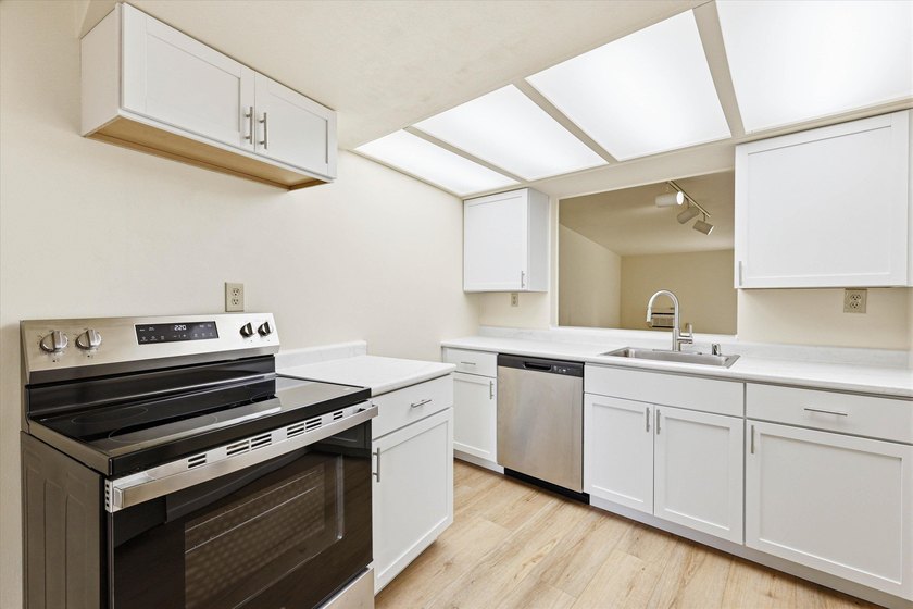 Why rent when you can own? This move-in ready condo features a - photo 9
