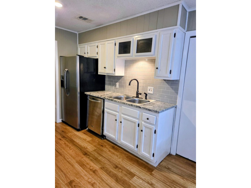 Welcome home to this charming 3-bedroom, 1-bath home that's - photo 8