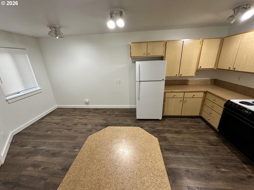 VA approved condo. Two bedroom one bath ground level condo with - photo 8