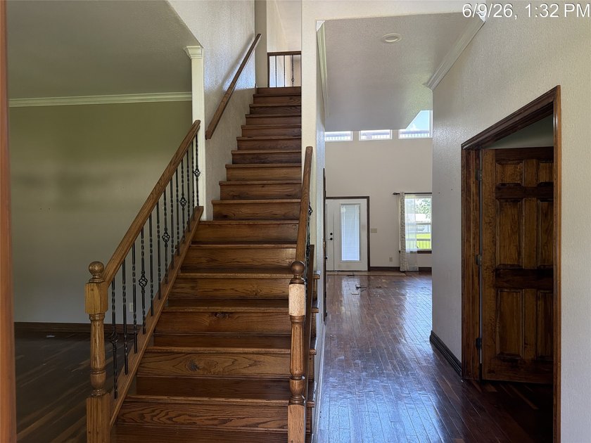 Set on 1.48 wooded acres along Lake Limestone, this custom stone - photo 5