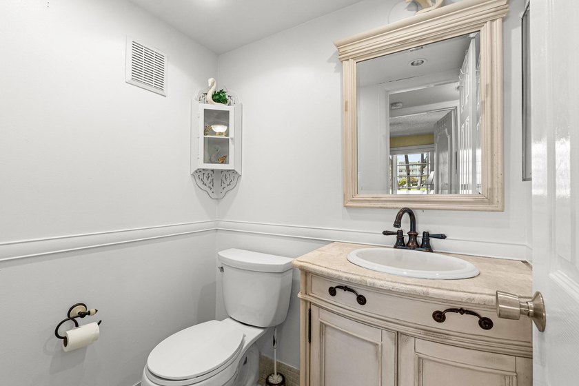 Beautifully updated and meticulously maintained corner first - photo 21