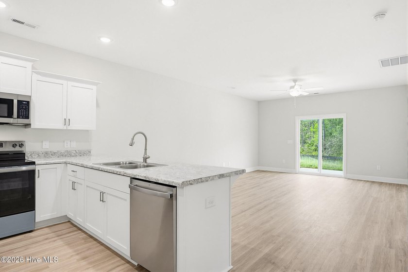 **COMPLETED NEW CONSTRUCTION** Offering $2,000 USE AS YOU CHOOSE - photo 11
