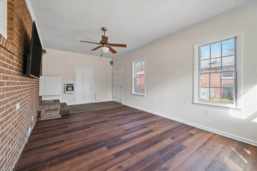 Welcome home to this well-cared-for brick beauty in the heart of - photo 21