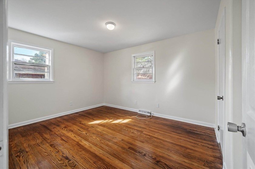Welcome home to this well-cared-for brick beauty in the heart of - photo 22