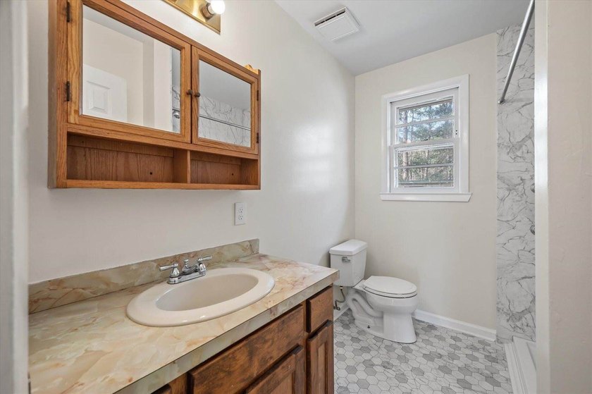Welcome home to this well-cared-for brick beauty in the heart of - photo 25