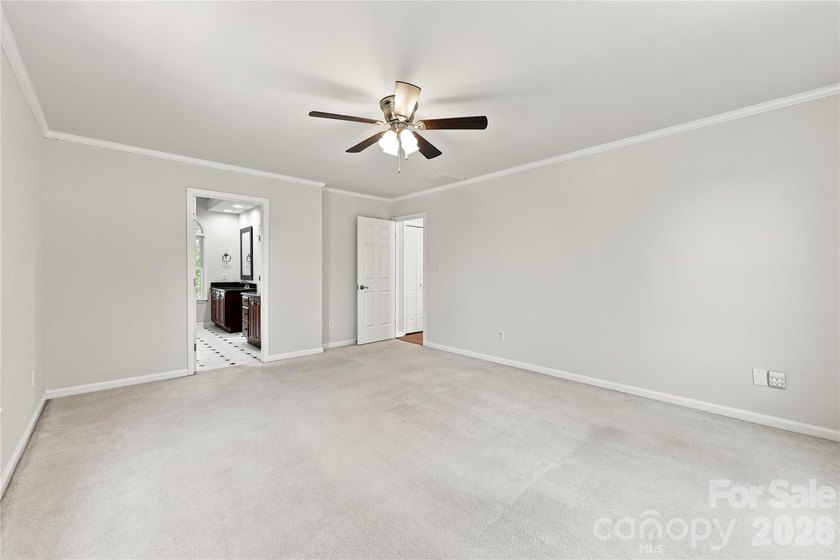 Nestled on a sprawling .36-acre homesite in the coveted - photo 19