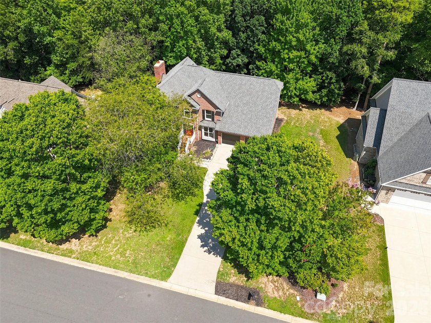 Nestled on a sprawling .36-acre homesite in the coveted - photo 42