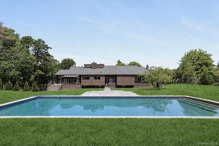 Thoughtfully renovated Southampton property set behind an - photo 3