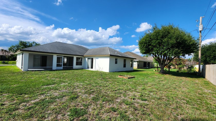 Spacious 4BR/3BA home in southwest Port St. Lucie near the - photo 4