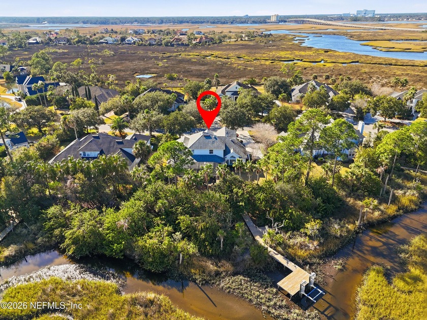 Tucked along a quiet tidal creek in the heart of Marsh Landing - photo 2