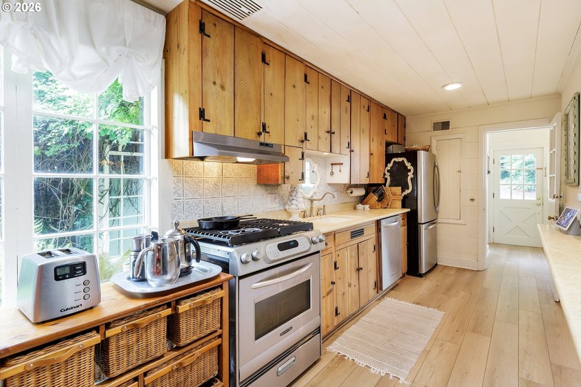 A one-of-a-kind historic gem, this Storybook Cottage was built - photo 10