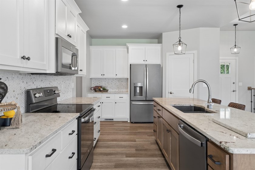 Impressive ranch! As you enter the open-concept design welcomes - photo 10